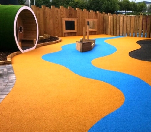 Rubber playground mat in blue and orange